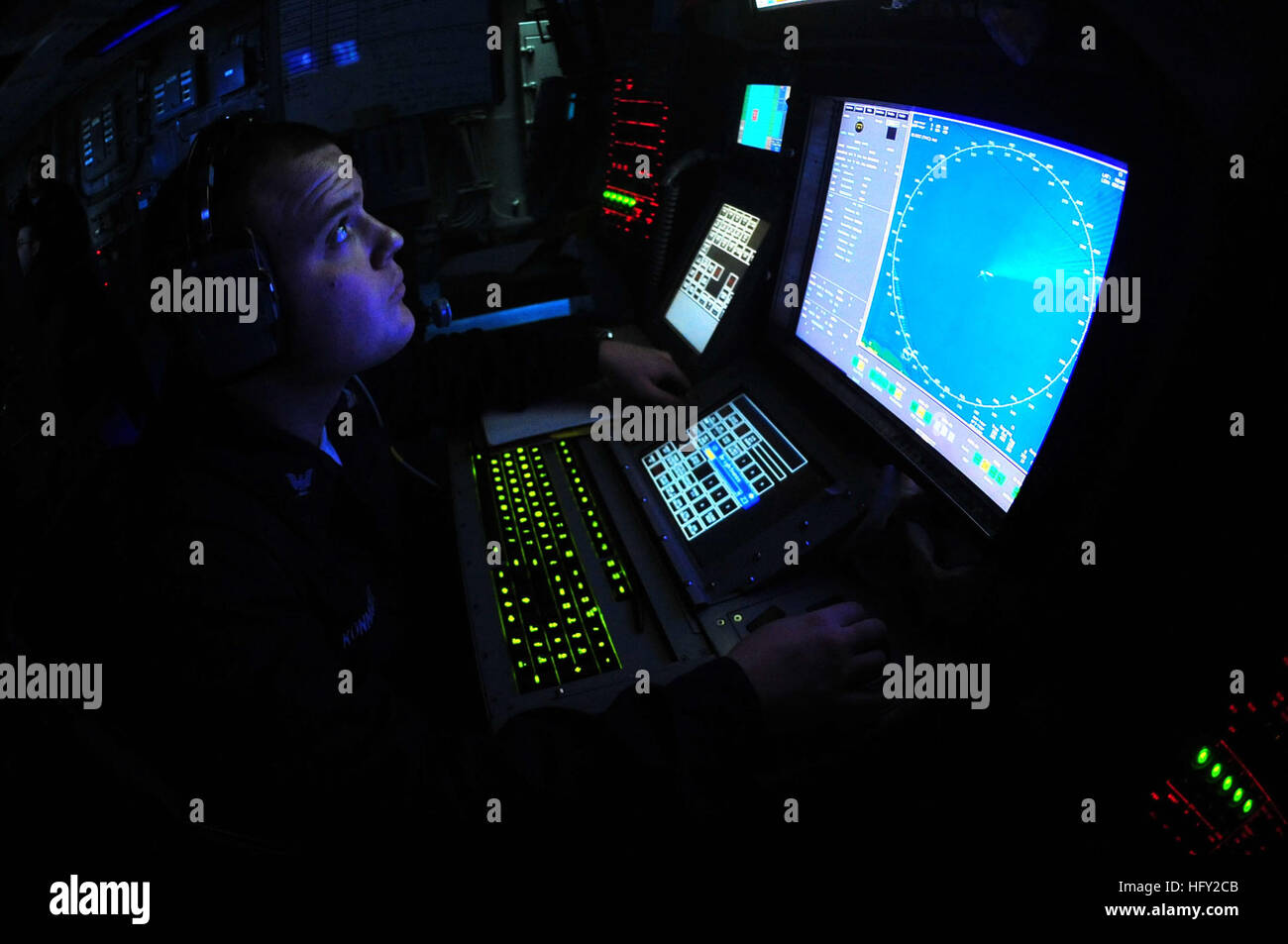 100218-N-2953W-100 ATLANTIC OCEAN (Feb. 18, 2010) Operations Specialist 3rd Class Eric Konnight, assigned to the Nimitz-class aircraft carrier USS Carl Vinson (CVN 70), stands an identification operations watch in the combat directions center. Carl Vinson is taking part in Southern Seas 2010 as part of a scheduled homeport shift. (U.S. Navy photo by Mass Communication Specialist 2nd Class Adrian White/Released) US Navy 100218-N-2953W-100 Operations Specialist 3rd Class Eric Konnight stands an identification operations watch in the combat directions center Stock Photo