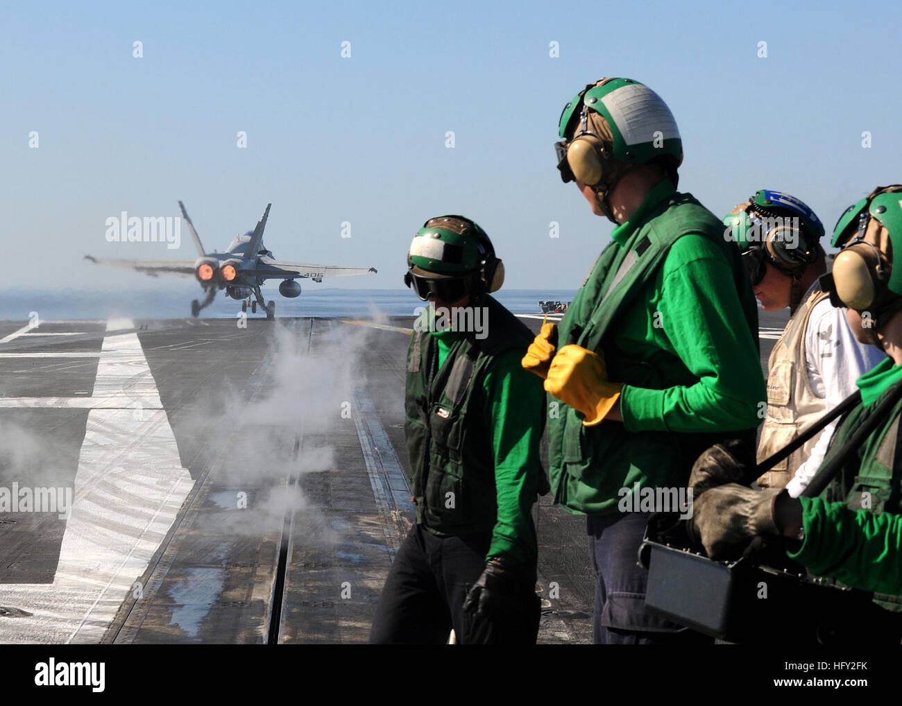 100220-N-4236E-159 GULF OF OMAN (Feb. 20, 2010) An F/A-18C Hornet assigned to the Wildcats of Strike Fighter Squadron (VFA) 131, launches from the Nimitz-class aircraft carrier USS Dwight D. Eisenhower (CVN 69). Dwight D. Eisenhower is on a scheduled six-month deployment as part of the on-going rotation of forward-deployed forces. (U.S. Navy photo by Mass Communication Specialist 3rd Class Chad R. Erdmann/Released) US Navy 100220-N-4236E-159 An F-A-18C Hornet assigned to the Wildcats of Strike Fighter Squadron (VFA) 131, launches from the Nimitz-class aircraft carrier USS Dwight D. Eisenhower  Stock Photo