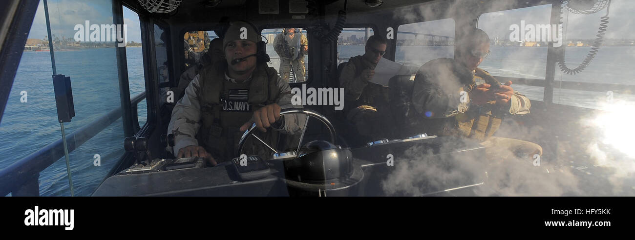 Sailors from Maritime Expeditionary Security Squadron 3 operate a rigid ...