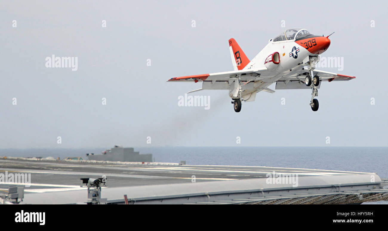 100424-N-3885H-155 ATLANTIC OCEAN (April 24, 2010) A T-45C Goshawk training aircraft assigned to Carrier Training Wing (CTW) 2 takes off after completing a touch-and-go landing aboard the aircraft carrier USS George H.W. Bush (CVN 77). George H.W. Bush is conducting carrier qualifications in the Atlantic Ocean. (U.S. Navy photo by Mass Communication Specialist 3rd Class Nicholas Hall/Released) US Navy 100424-N-3885H-155 A T-45C Goshawk training aircraft assigned to Carrier Training Wing (CTW) 2 takes off after completing a touch-and-go landing Stock Photo