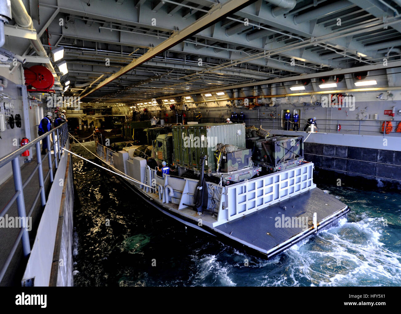 100428-N-2147L-002 ONSLOW BAY, N.C. (April 28, 2010)) Landing Craft Utility (LCU) 1661, assigned to Assault Craft Unit (ACU 2), prepares to depart the well deck of the amphibious transport dock ship USS New York (LPD 21). New York is underway conducting training in the Atlantic Ocean. (U.S. Navy photo by Mass Communication Specialist 1st Class Corey Lewis/Released) US Navy 100428-N-2147L-002 Landing Craft Utility (LCU) 1661 prepares to depart the well deck of USS New York (LPD 21) Stock Photo