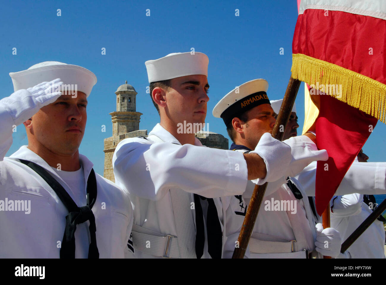 100604-N-7638K-030  MAHON, Spain (June 4, 2010) Fire Controlman 2nd Class Kevin McCarthy, left, from Daytona Beach, Fla., and Yeoman 3rd Class Jeremy Tenney, from Lexington Park, Md., participate in a color guard during the Adm. David Farragut celebration at Port Mahon, Menorca, Spain. Farragut was the U.S. Navy's first admiral. McCarthy and Tenney are both assigned to the guided-missile frigate USS Taylor (FFG 50), which is participating in Operation Active Endeavor providing a safe and secure Mediterranean Sea. (U.S. Navy photo by Mass Communication Specialist 1st Class Edward Kessler/releas Stock Photo