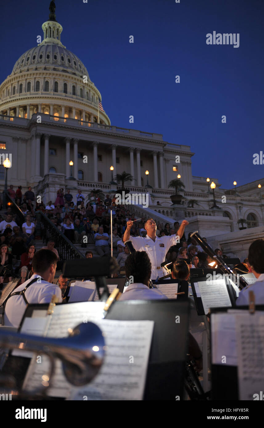 100607-N-0773H-081  WASHINGTON, D.C. (June 7, 2010) Lt. Cmdr. Brian O. Walden, commanding officer of the U.S. Navy Band, conducts the Concert Band during an evening concert at the U.S. Capitol. Every Monday evening from Memorial Day to Labor Day, units of the U.S. Navy Band present their annual summer concert series on the west steps of the U.S. Capitol in Washington, D.C. (U.S. Navy photo by Chief Musician Stephen Hassay/Released) US Navy 100607-N-0773H-081 Lt. Cmdr. Brian O. Walden, commanding officer of the U.S. Navy Band, conducts the Concert Band during an evening concert at the U.S. Capi Stock Photo