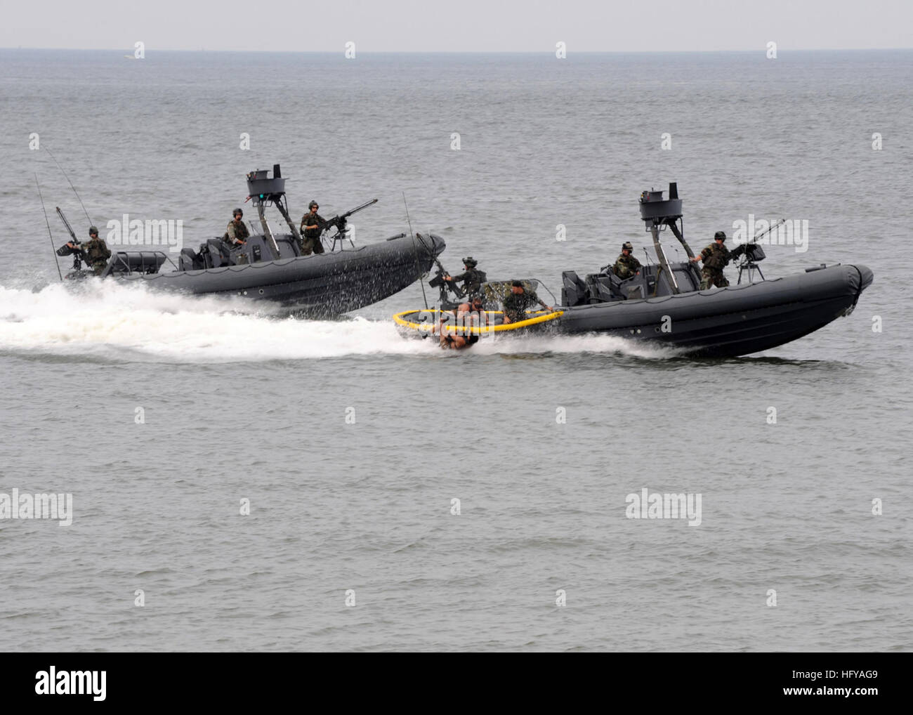 U.S. Navy SEALs conduct a water capabilities demonstration using a ...