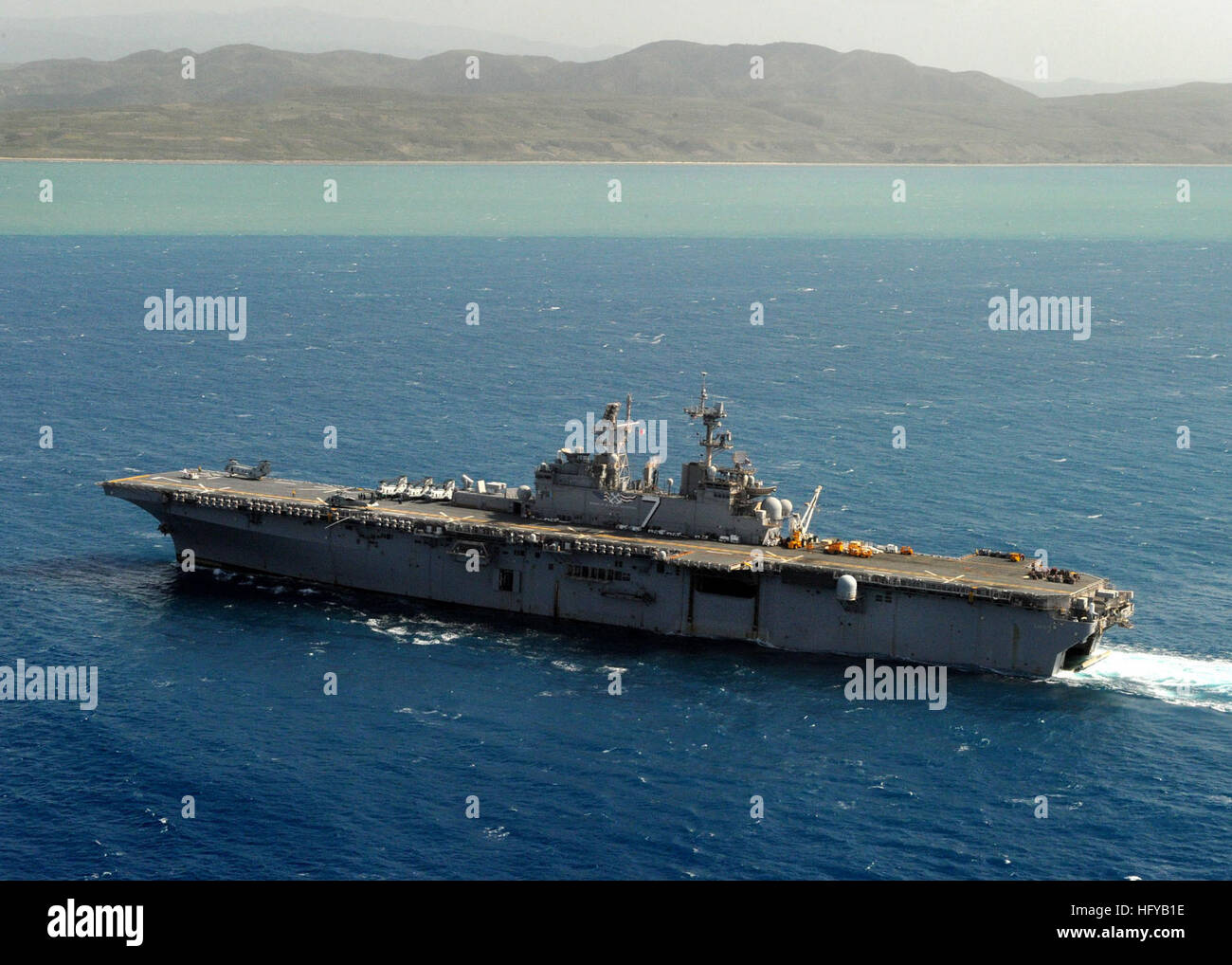 The amphibious assault ship USS Iwo Jima is underway off the coast of ...