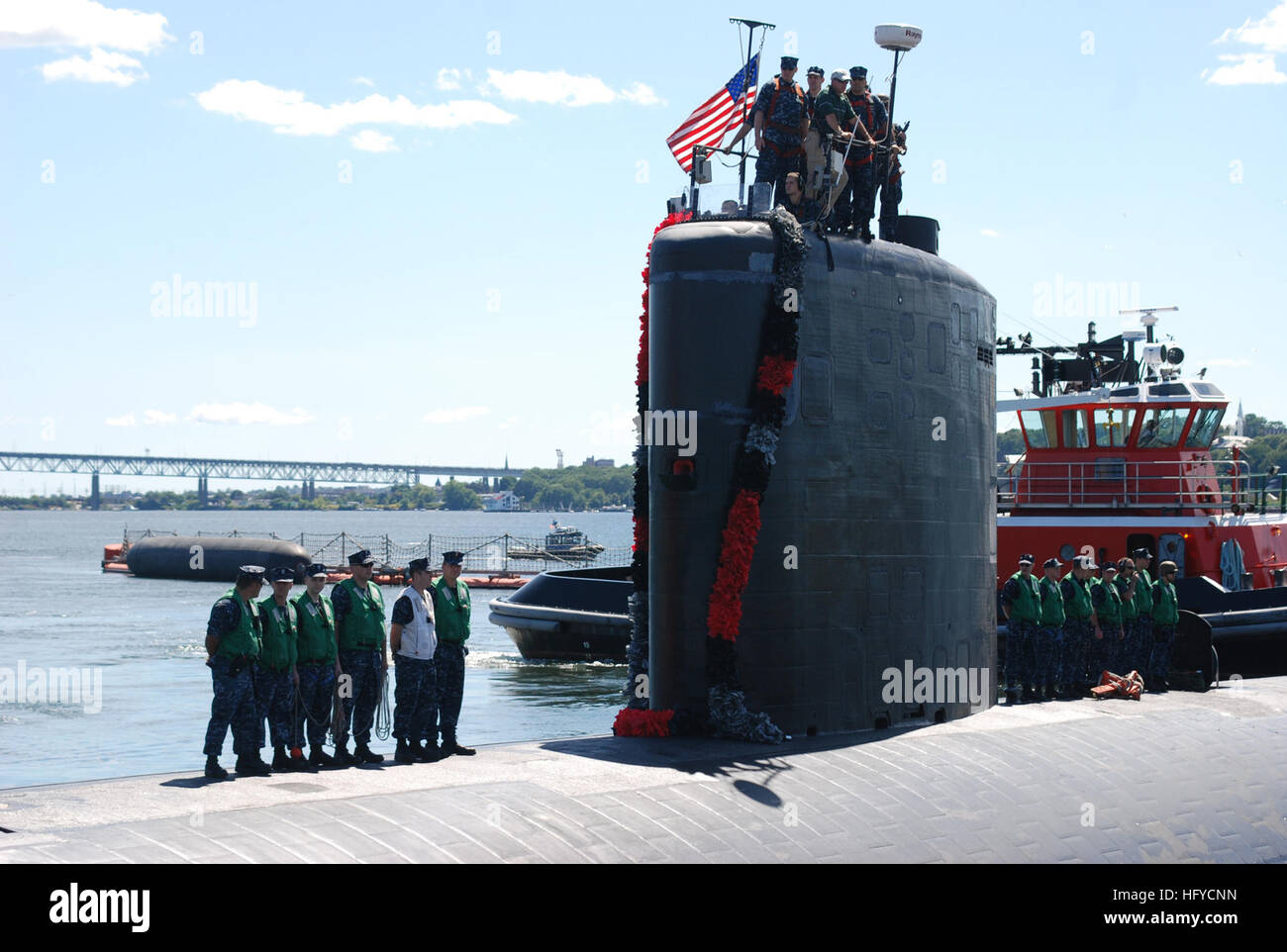 Sailors aboard the Los Angeles-class attack submarine USS Annapolis ...