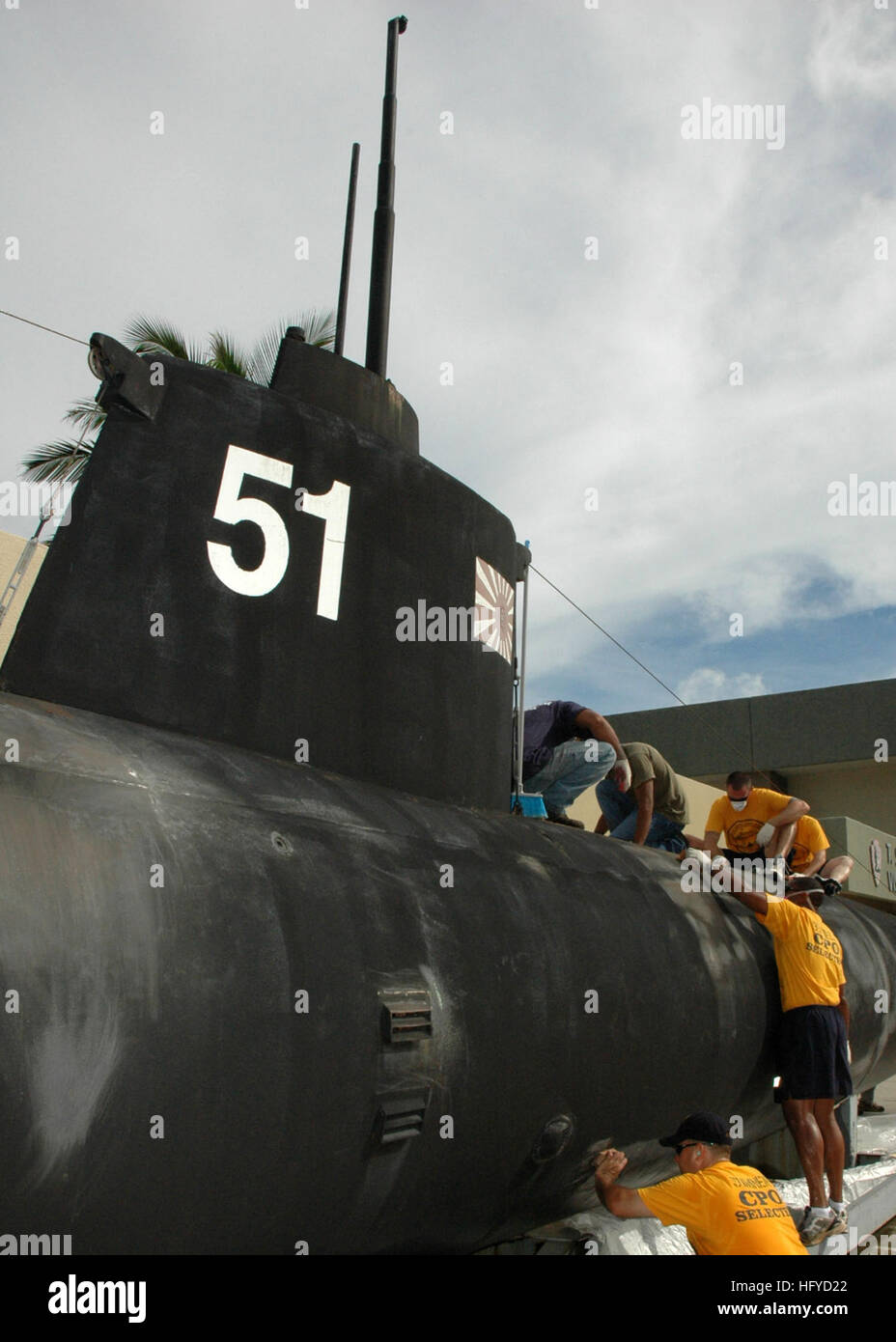 100828-N-5216W-008 SANTA RITA, Guam (Aug. 28, 2010) Chief petty officers and chief petty officer selects from the submarine tender USS Frank Cable (AS 40) perform preservation maintenance on Japanese navy submarine HA-51, a World War II Type C three-man midget submarine, at the T. Snell Newman Visitor Center. Cable is undergoing upgrades at Guam Shipyard for a conversion to the Military Sealift Command. (U.S. Navy photo by Chief Mass Communication Specialist Jennifer L. Walker/Released) US Navy 100828-N-5216W-008 Chief petty officers and chief petty officer selects from the submarine tender US Stock Photo