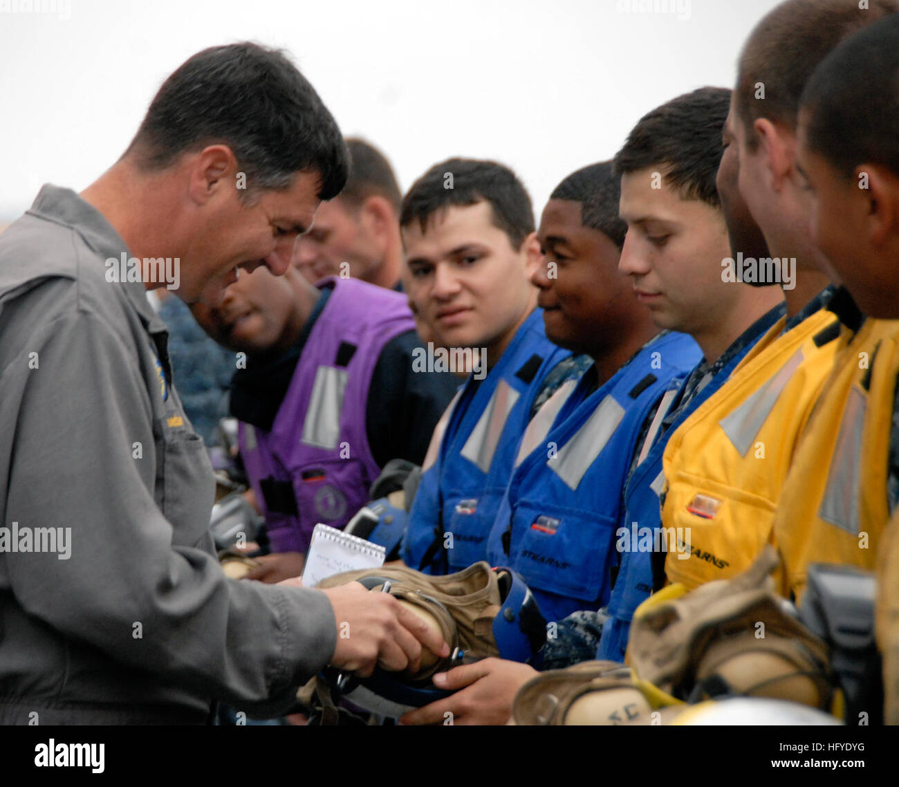 INSURV inspector examines cranial helmets aboard amphibious assault ...