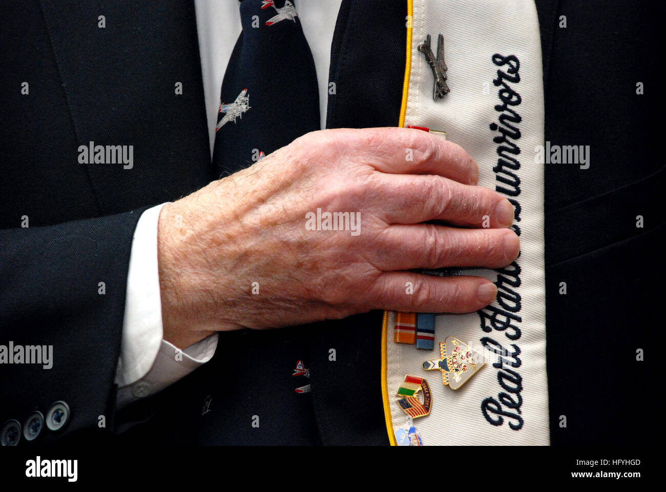 101207-N-1251W-001 Willow Grove, Pa. (Dec. 7, 2010) A survivor of the Dec. 7, 1941 Japanese attack on Pearl Harbor holds his cover over his heart during a Pearl Harbor Day ceremony at Naval Air Station Joint Reserve Base Willow Grove, Pa. This will be the last Pearl Harbor Day ceremony at the base before it closes in Sept. 2011 due to Base Realignment and Closure.  (U.S. Navy photo by Mass Communication Specialist 2nd Class Matthew R. White/Released) US Navy 101207-N-1251W-001 A survivor of the Dec. 7, 1941 Japanese attack on Pearl Harbor holds his cover over his heart during a Pearl Harbor Da Stock Photo