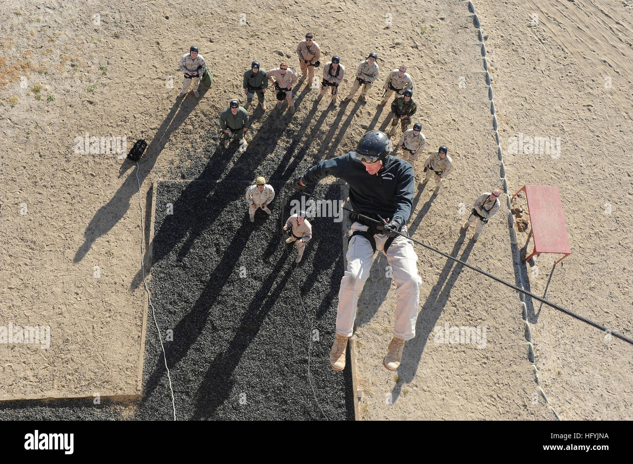 Explosive Ordnance Disposal personnel perform helicopter rope ...