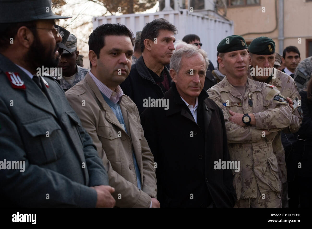 Senate Foreign Relations Committee member Sen. Bob Corker, R-Tenn., looks at students training at the Afghan National Police Academy Feb. 20, in Kabul, Afghanistan. The police displayed how to clear a building and search a suspect to a congressional delegation visiting the NATO Training Mission-Afghanistan supported training site. US Senators visit Afghan National Police Academy, witness demonstration DVIDS369237 Stock Photo