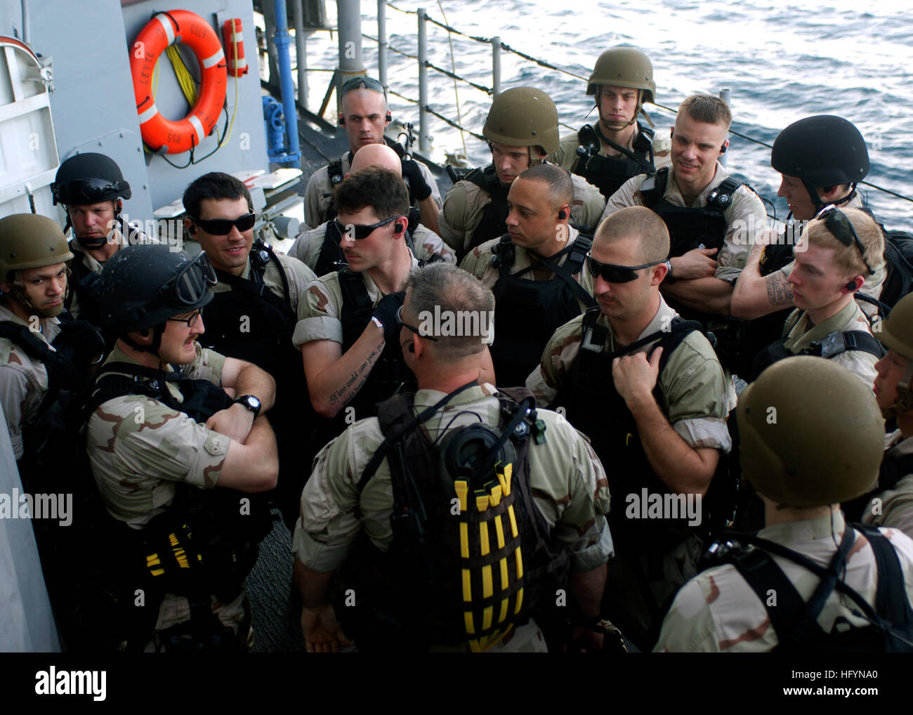 110325-N-BZ392-066 ARABIAN SEA (March 25, 2011) Sailors assigned to the visit, board, search and seizure team (VBSS) aboard the guided-missile cruiser USS Leyte Gulf (CG 55) prepare for an  operation on the Philippine-flagged merchant vessel Falcon Trader II which sent out a distress call reporting it had been boarded by pirates. Leyte Gulf is deployed to the U.S. 5th Fleet area of responsibility to conduct maritime security operations. (U.S. Navy photo by Mass Communication Specialist 3rd Class Robert Guerra/Released) US Navy 110325-N-BZ392-066 Sailors assigned to the VBSS team aboard USS Ley Stock Photo