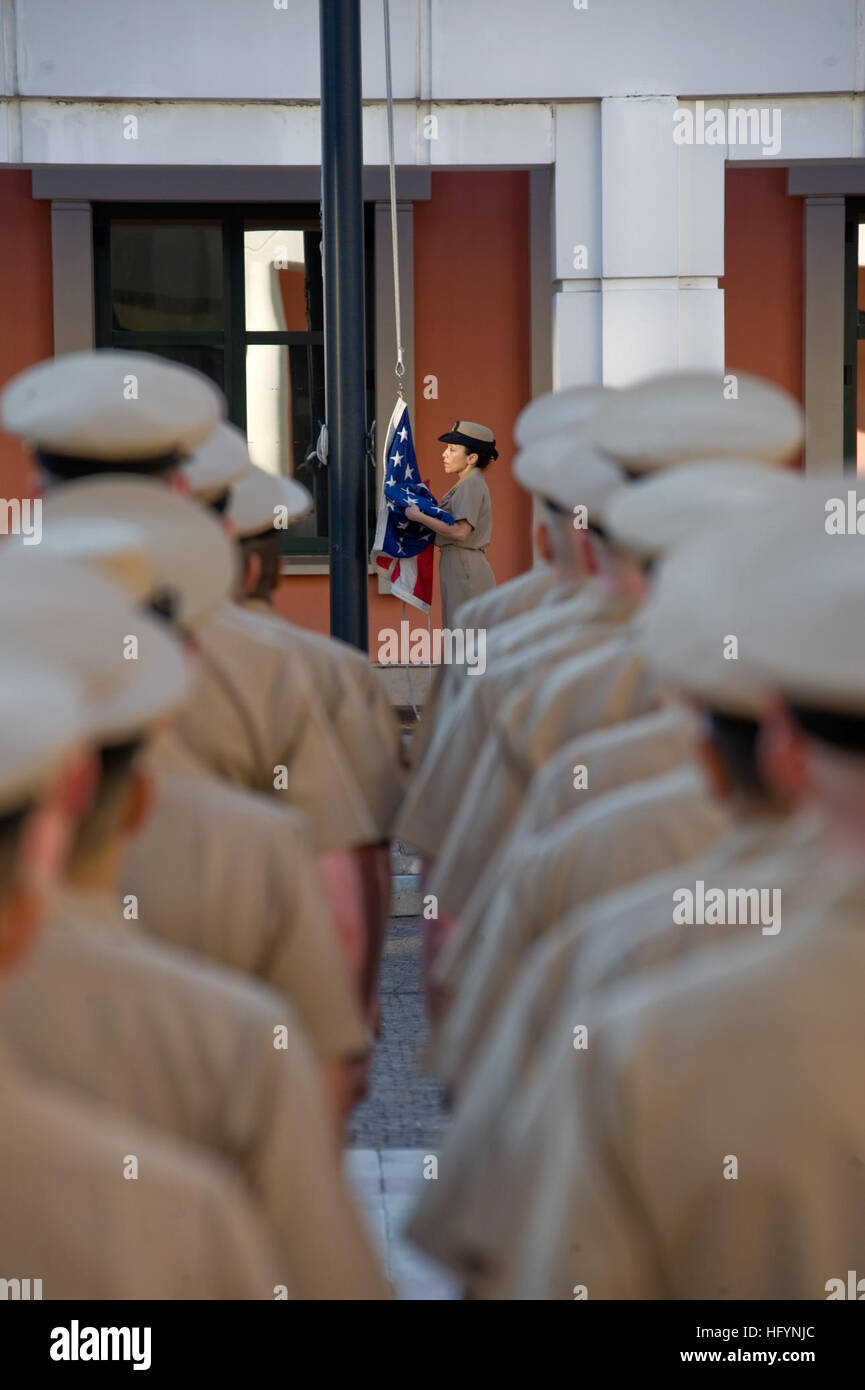 110401-N-GT324-123 NAPLES, Italy (April 1, 2011) Senior Chief Legalman Leonette Masters stands by to raise the national ensign during morning colors at Naval Support Activity Naples. Masters and other area chief petty officers formed ranks for colors as part of their celebration of the 118th birthday for chief petty officer rank.  (U.S. Navy photo by Mass Communication Specialist 2nd Class Marc Rockwell-Pate/Released) US Navy 110401-N-GT324-123 Senior Chief Legalman Leonette Masters stands by to raise the national ensign during morning colors at Naval Support Act Stock Photo