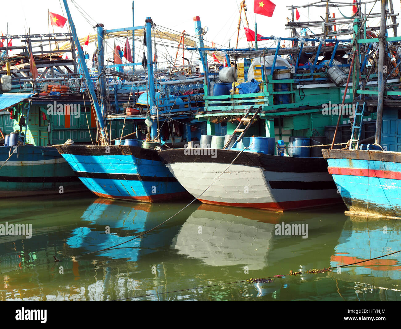 old blue wooden fishing boats in Da Nang Stock Photo - Alamy