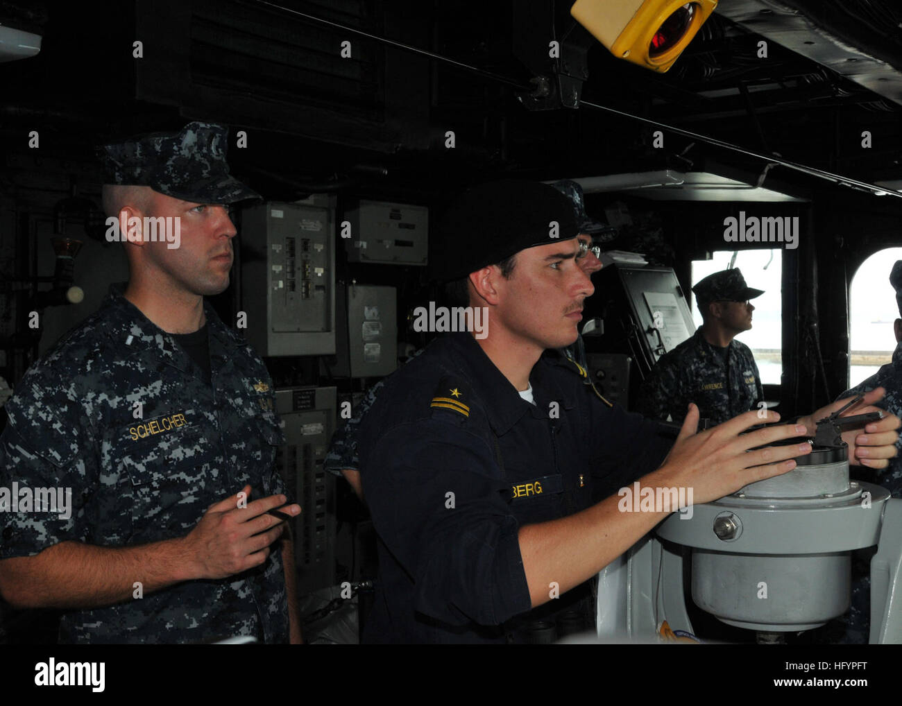 110421-N-NL541-128 SALVADOR, Brazil (April 21, 2011) Lt. j.g. Michael Schelcher, left, and Lt. j.g. Pablo Berg, from the Chilean navy, observe from the pilot house as the guided-missile frigate USS Thach (FFG 43) departs the pier at Salvador, Brazil. Thach is deployed in support of Southern Seas 2011. (U.S. Navy photo by Mass Communication Specialist 3rd Class Stuart Phillips/Released) US Navy 110421-N-NL541-128 Lt. j.g. Michael Schelcher, left, and Lt. j.g. Pablo Berg, from the Chilean navy, observe from the pilot house as the gu Stock Photo