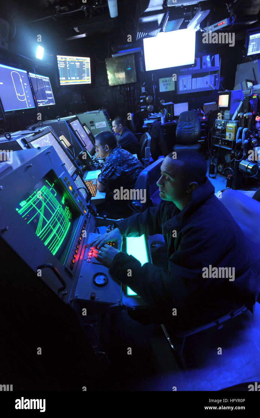 110503-N-0569K-028 ARABIAN SEA (May 3, 2011) Sailors man their positions in the Carrier Air Traffic Control Center aboard the aircraft carrier USS Enterprise (CVN 65). Enterprise and Carrier Air Wing (CVW) 1 are conducting close-air support missions as part of Operation Enduring Freedom in the U.S. 5th Fleet area of responsibility. (U.S. Navy photo by Mass Communication Specialist Seaman Jared M. King/Released) US Navy 110503-N-0569K-028 Sailors man their positions in the Carrier Air Traffic Control Center aboard USS Enterprise (CVN 65) Stock Photo