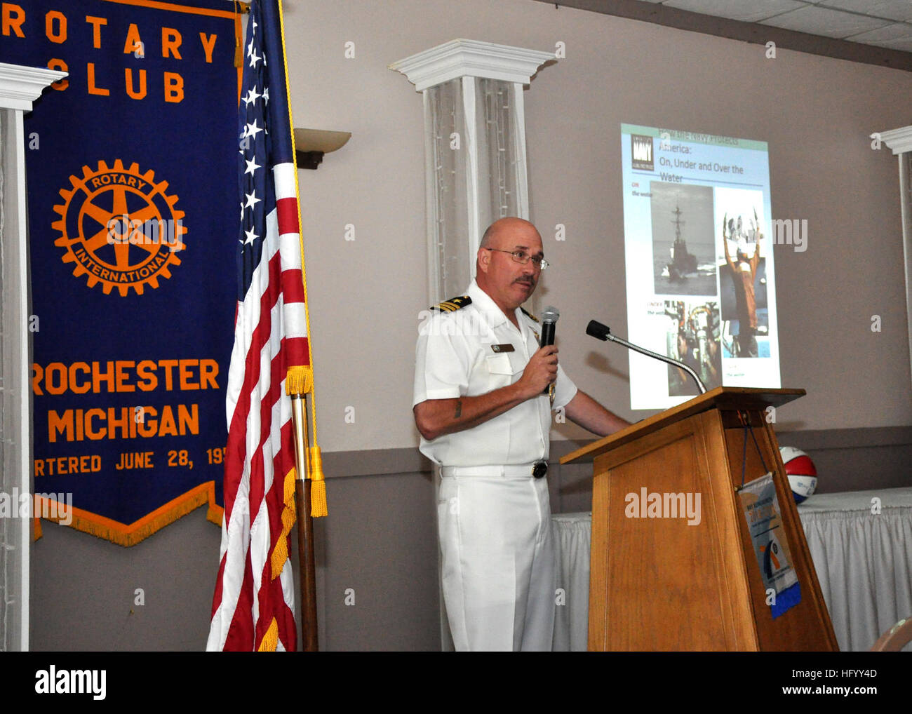 110719-N-VO219-002 ROCHESTER, Mich. (July 19, 2011) Cmdr. Richard Simpson, executive officer of Navy Recruiting District Michigan, delivers remarks to the Rochester Rotary Club during a Detroit Navy Week 2011 event. Detroit Navy Week is one of 21 Navy Weeks this year across the country. Navy Weeks are intended to showcase the investment Americans have made in their Navy and increase awareness in cities that do not have a significant Navy presence. (U.S. Navy photo by Mass Communication Specialist 1st Class Joseph R. Wax/Released) US Navy 110719-N-VO219-002 Cmdr. Richard Simpson, executive offi Stock Photo