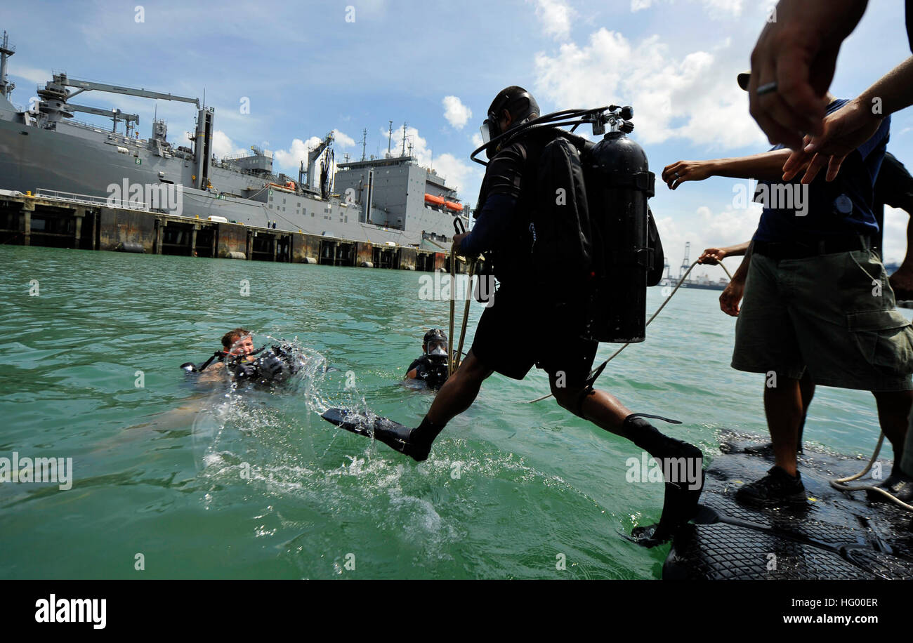 A Panamanian navy diver conducts a front step water entry with MDSU-2 ...