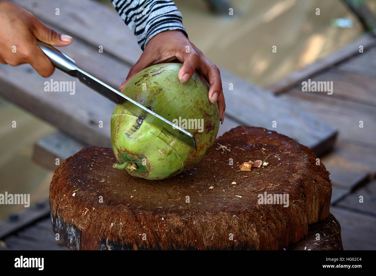 Coconut preparation cutting Stock Photo Alamy