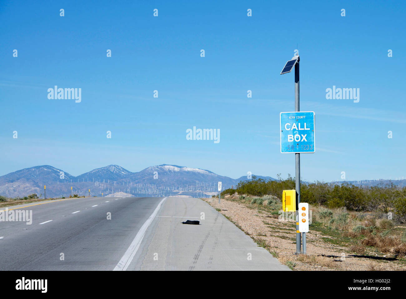 Call box on the side of the road along Interstate 58 in California. Each call box is a battery