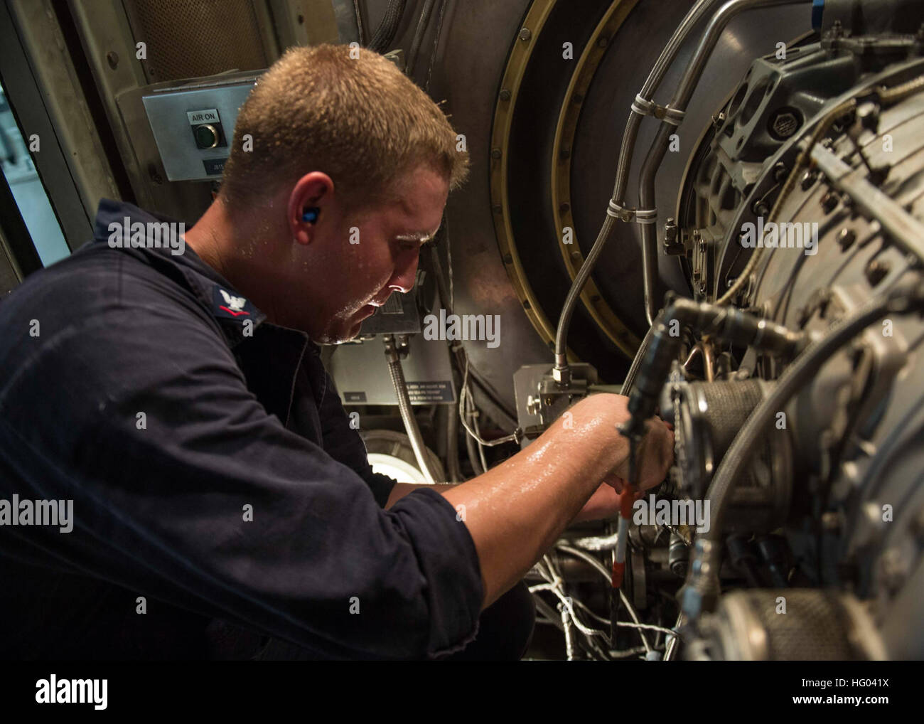 160827-N-GP524-508 NAVAL SUPPORT ACTIVITY BAHRAIN (Aug. 27, 2016) Gas Turbine System Technician (Electrical) 3rd Class Nathan Super, from Sarasota, Fla., conducts maintenance in an engineering space aboard the guided-missile destroyer USS Stout (DDG 55). Stout, deployed as part of the Eisenhower Carrier Strike Group, is supporting maritime security operations and theater security cooperation efforts in the U.S. 5th Fleet area of operations. (U.S. Navy photo by Mass Communication Specialist 3rd Class Bill Dodge) USS STOUT (DDG 55) DEPLOYMENT 2016 160827-N-GP524-508 Stock Photo