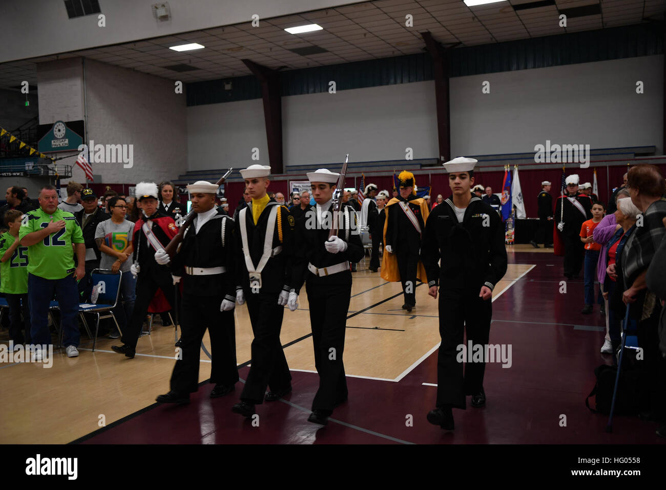 161111-N-EC099-117 SILVERDALE, Wash. (Nov. 11, 2016) Members of the Knights of Columbus and the Naval Sea Cadet Corps color guards parade the colors during the 2016 Veterans Day ceremony held in the Kitsap Sun Pavilion. The ceremony paid respect to service members both past and present and remembered those service members lost during the history of the United States. (U.S. Navy photo by Petty Officer 3rd Class Charles D. Gaddis IV/Released) Veterans Day Ceremony Held At Kitsap Sun Pavalion 161111-N-EC099-117 Stock Photo