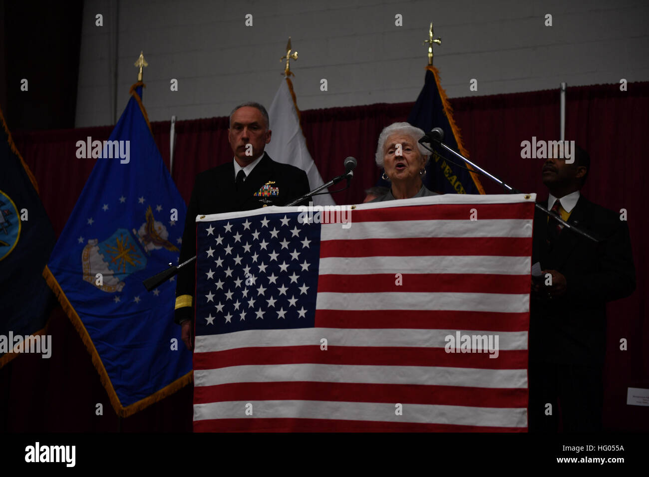 161111-N-EC099-166 SILVERDALE, Wash. (Nov. 11, 2016) Ms. Joyce Paxson sings the National Anthem during the 2016 Veterans Day ceremony held in the Kitsap Sun Pavilion. The ceremony paid respect to service members both past and present and remembered those service members lost during the history of the United States. (U.S. Navy photo by Petty Officer 3rd Class Charles D. Gaddis IV/Released) Veterans Day Ceremony Held At Kitsap Sun Pavalion 161111-N-EC099-166 Stock Photo