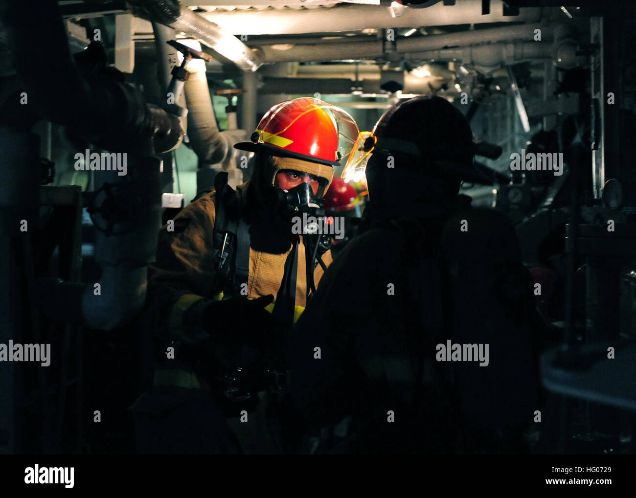 Engine Team Procedures Fire assessment teams aboard USS Pinckney conduct a general quarters ...