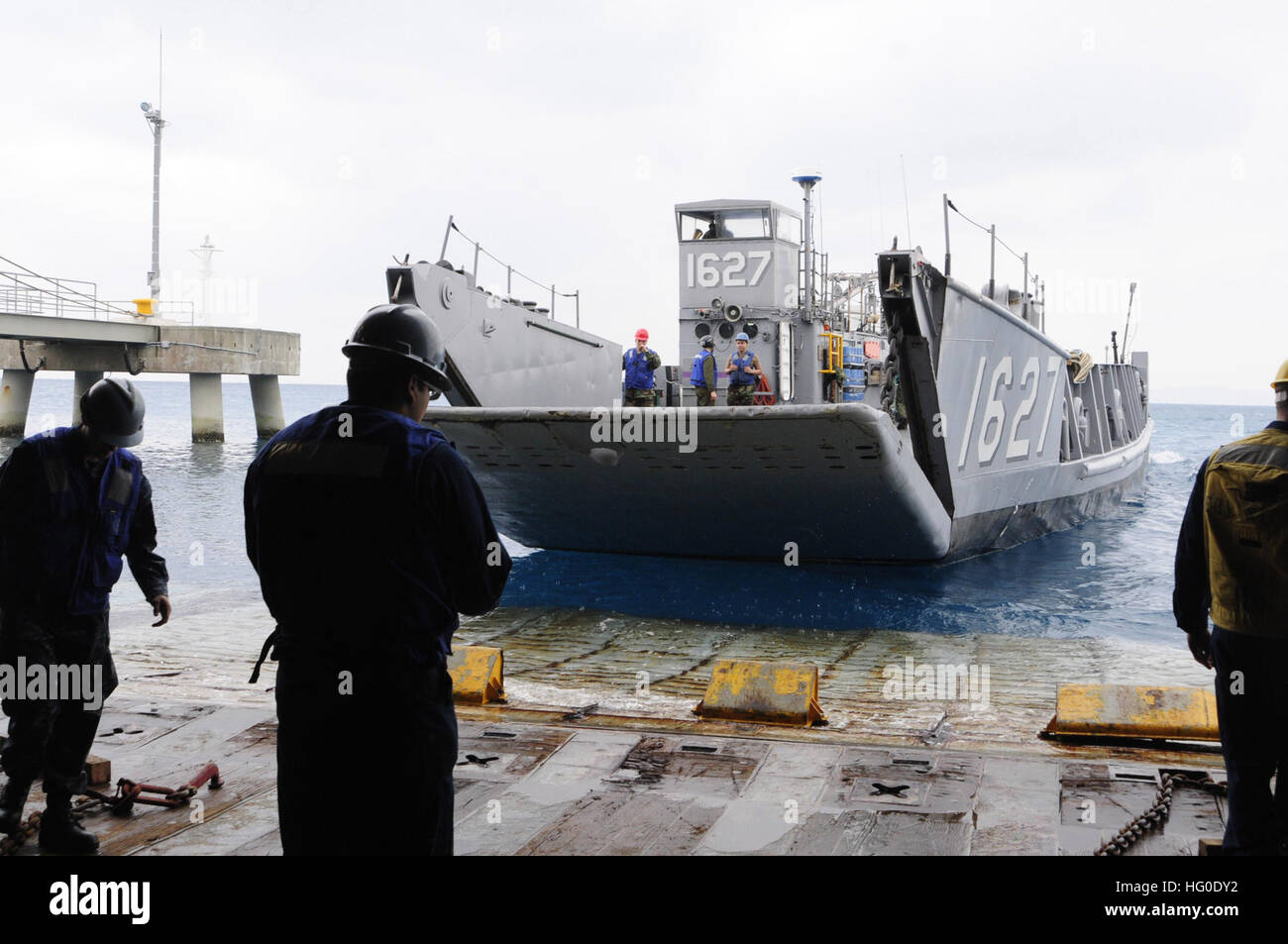 Landing Craft Utility 1627 departs the well deck of the forward ...