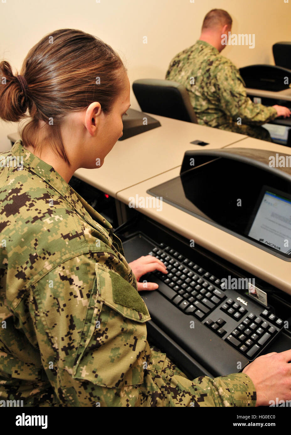 120208-N-AW868-016  GULFPORT, Miss. (Feb. 8, 2012) Seabees at Naval Construction Battalion Center Gulfport, Miss. complete a Navy computer adaptive personality scales questionnaire. The questionnaire measures 19 personality traits that are tied to the critical job/work requirements for all Navy ratings, and will someday help the Navy classify Sailors based on more individual information than the armed services vocational aptitude battery scores alone. (U.S. Navy photo by Chief Mass Communication Specialist Ryan G. Wilber/Released) US Navy 120208-N-AW868-016 Seabees at Naval Construction Battal Stock Photo