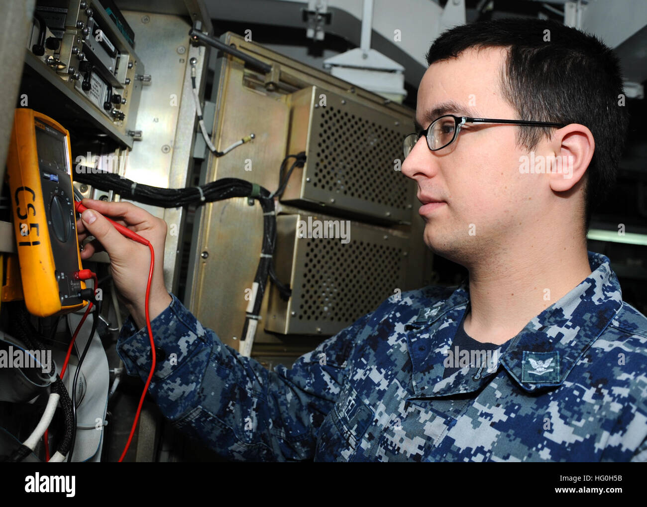 U.S. Navy Electronics Technician 3rd Class Matthew McNeely takes a