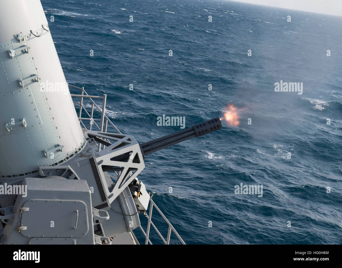 A close-in weapon system (CIWS) is fired during a pre-aim calibration aboard the aircraft carrier USS Harry S. Truman (CVN 75) April 21, 2013, in the Atlantic Ocean. The CIWS was designed as a naval shipboard point-defense weapon for detecting and destroying short-range incoming targets. (U.S. Navy photo by Mass Communication Specialist Apprentice Laura Hoover/Released) USS Harry S. Truman activity 130421-N-CE241-001 Stock Photo