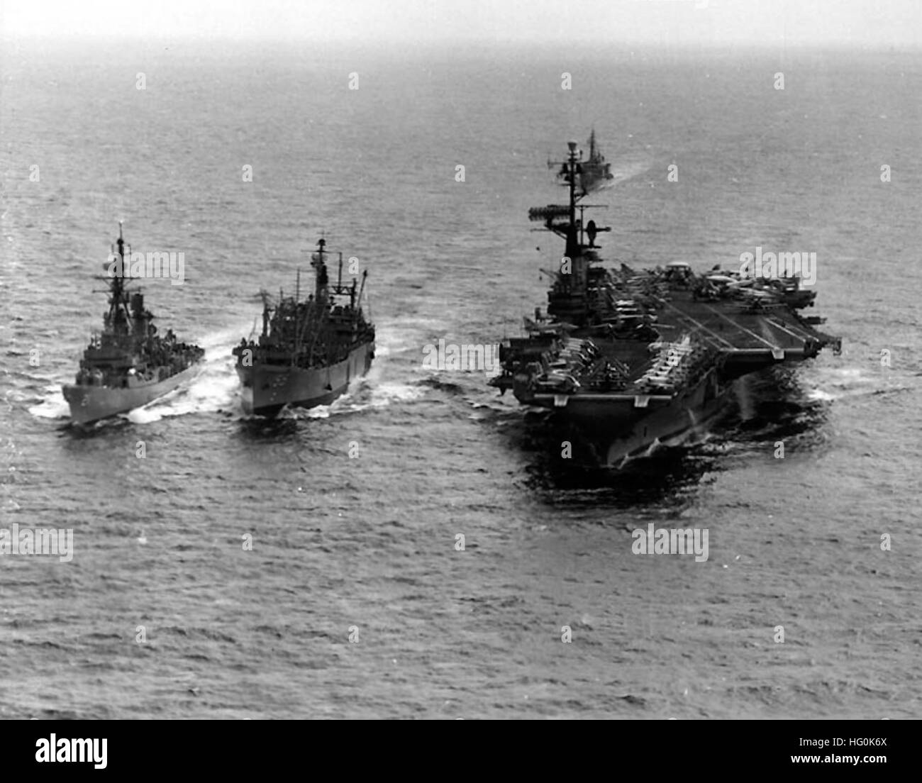 USS Aludra (AF-55) with Coral Sea (CVA-43) and Cochrane (DDG-21) off Vietnam 1965 Stock Photo