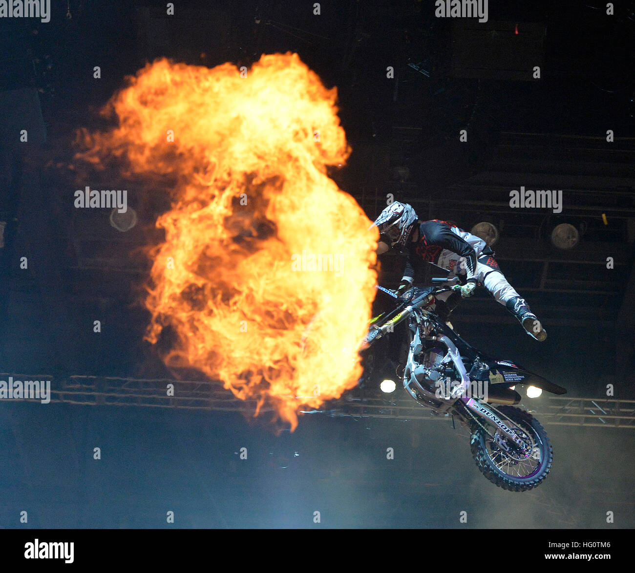 Motorcycle jumping through fire Stock Photo Alamy