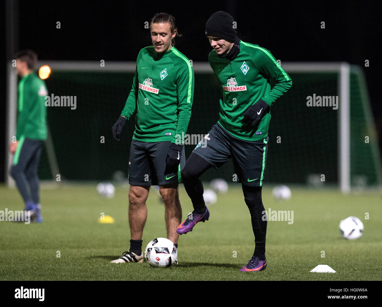 Bremen, Germany. 2nd Jan, 2017. Max Kruse (l) and Aron Johannsson of the Bundesliga soccer club Werder Bremen in action during the first training session for the second half of the season in Bremen, Germany, 2 January 2017. Photo: Ingo Wagner/dpa/Alamy Live News Stock Photo