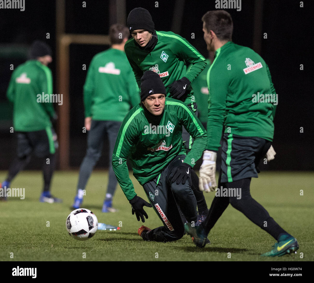 Bremen, Germany. 2nd Jan, 2017. Clemens Fritz (l-r), Aron Johannsson and goalkeeper Michael Zetterer of the Bundesliga soccer club Werder Bremen in action during the first training session for the second half of the season in Bremen, Germany, 2 January 2017. Photo: Ingo Wagner/dpa/Alamy Live News Stock Photo