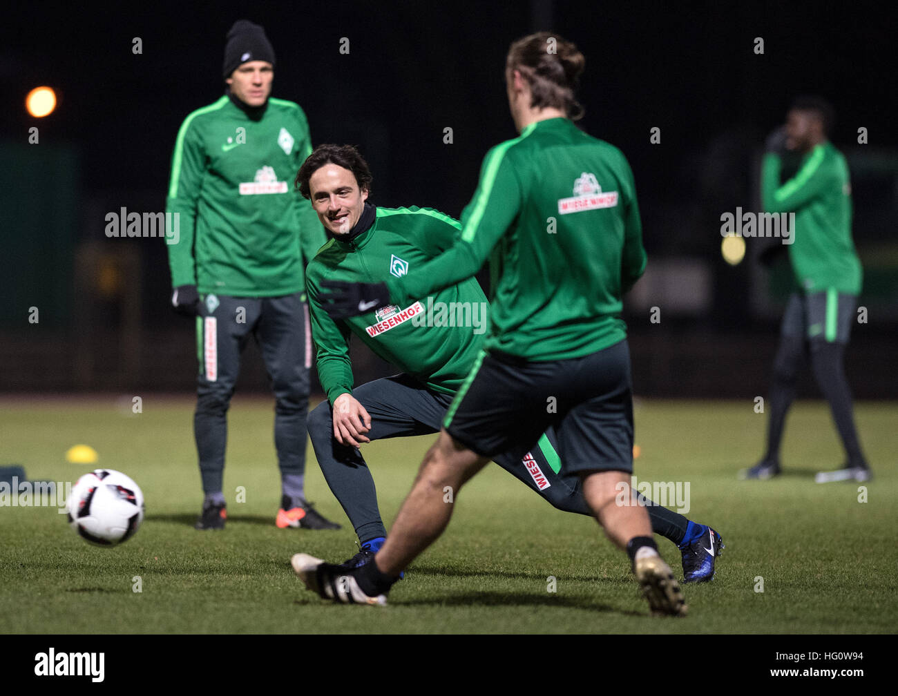 Bremen, Germany. 2nd Jan, 2017. Clemens Fritz (l-r), new team member Thomas Delaney and Max Kruse of the Bundesliga soccer club Werder Bremen in action during the first training session for the second half of the season in Bremen, Germany, 2 January 2017. Photo: Ingo Wagner/dpa/Alamy Live News Stock Photo