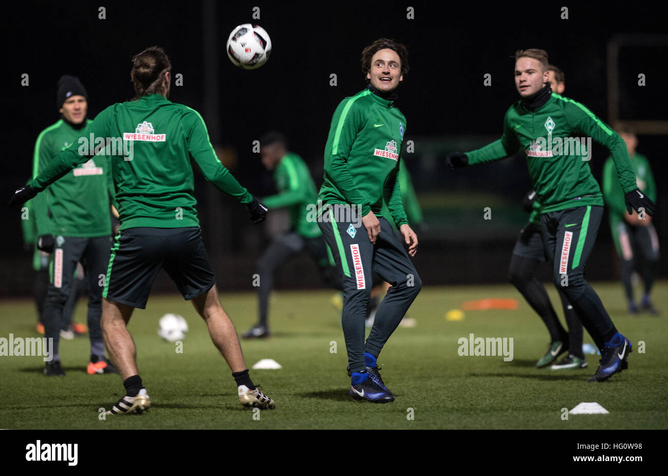 Bremen, Germany. 2nd Jan, 2017. Clemens Fritz (l-r), Max Kruse and new team member Thomas Delaney of the Bundesliga soccer club Werder Bremen in action during the first training session for the second half of the season in Bremen, Germany, 2 January 2017. Photo: Ingo Wagner/dpa/Alamy Live News Stock Photo