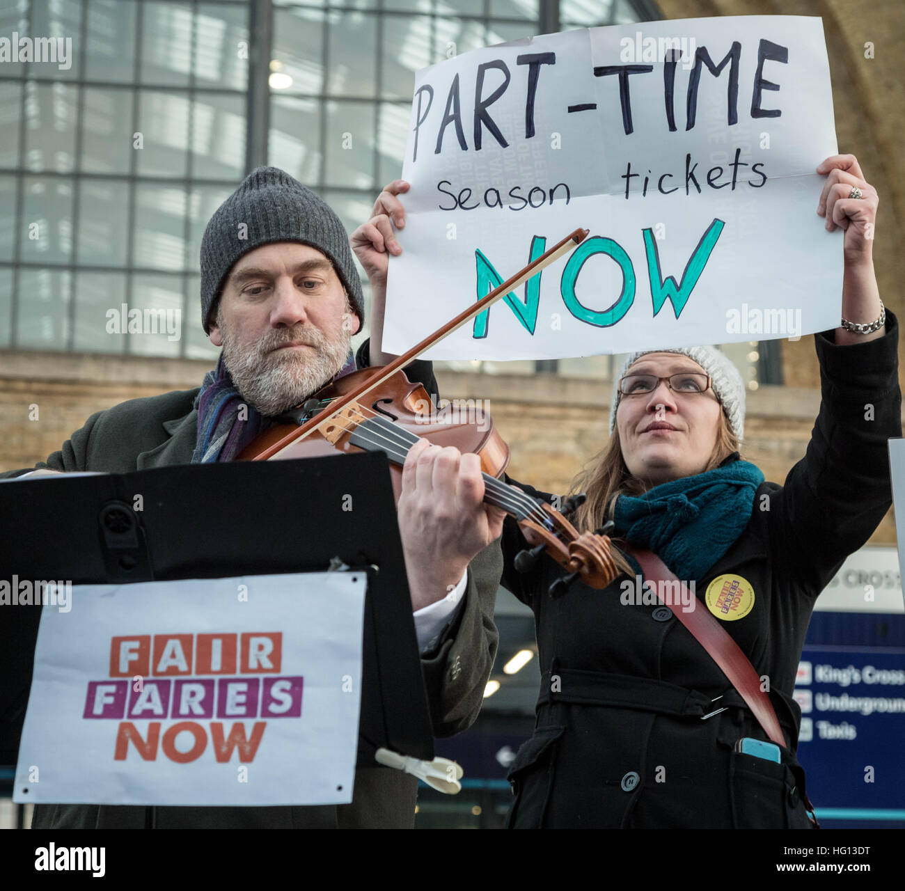 London, UK. 3rd Jan, 2017. Rail campaigners hold an early morning protest outside King's Cross station against fare increases. Commuters now face an average increase of 2.3% for rail travel in the new year © Guy Corbishley/Alamy Live News Stock Photo