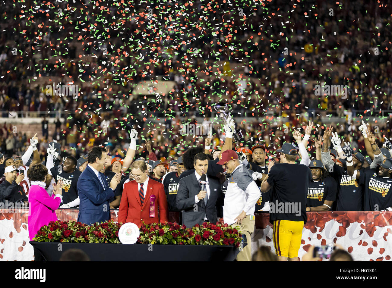 California, USA. 2nd Jan, 2017.  USC head coach Clay Helton being interviewed while the team holds up the Leishman Trophy after the Rose Bowl Game between Penn State Nittany Lions and University of Southern California Trojans at Rose Bowl Stadium in Pasadena, California. USC won 52-49. © Scott Taetsch/ZUMA Wire/Alamy Live News Stock Photo