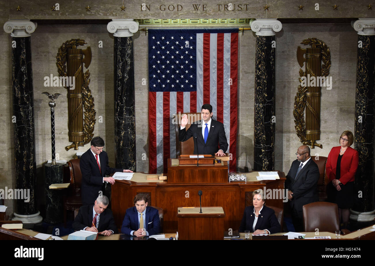 Washington, USA. 3rd Jan, 2017. Paul Ryan is sworn in after being re-elected as House Speaker during the opening of the 115th U.S. Congress on Capitol Hill in Washington, DC, the United States, on Jan. 3, 2017. The 115th U.S. Congress convenes on Tuesday with Republican Paul Ryan re-elected as House Speaker as expected while outgoing Vice President Joe Biden presides over the old Senate chamber for the last time. © Yin Bogu/Xinhua/Alamy Live News Stock Photo