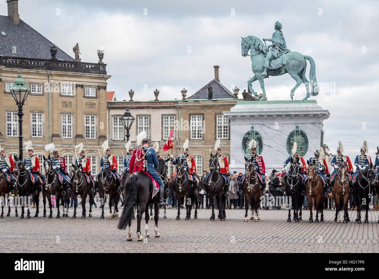 Copenhagen, Denmark - January 04, 2017: New Year traditional event. The Guard Hussar Regiment at Amalienborg Palace after having escorted Queen Margrethe in her 24-carat golden coachfrom Christiansborg Palace Stock Photo