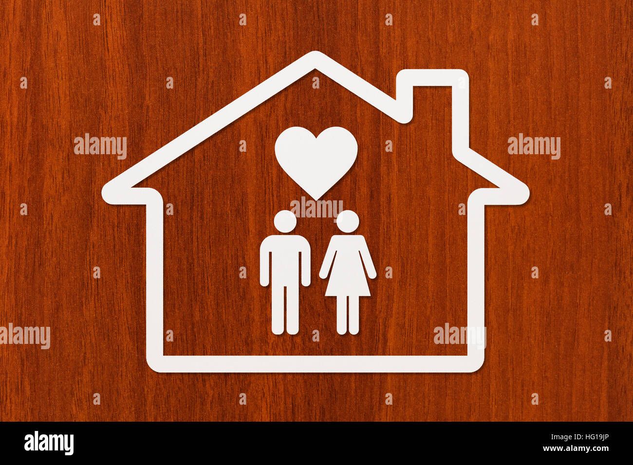 Paper house with man, woman and heart inside Stock Photo - Alamy