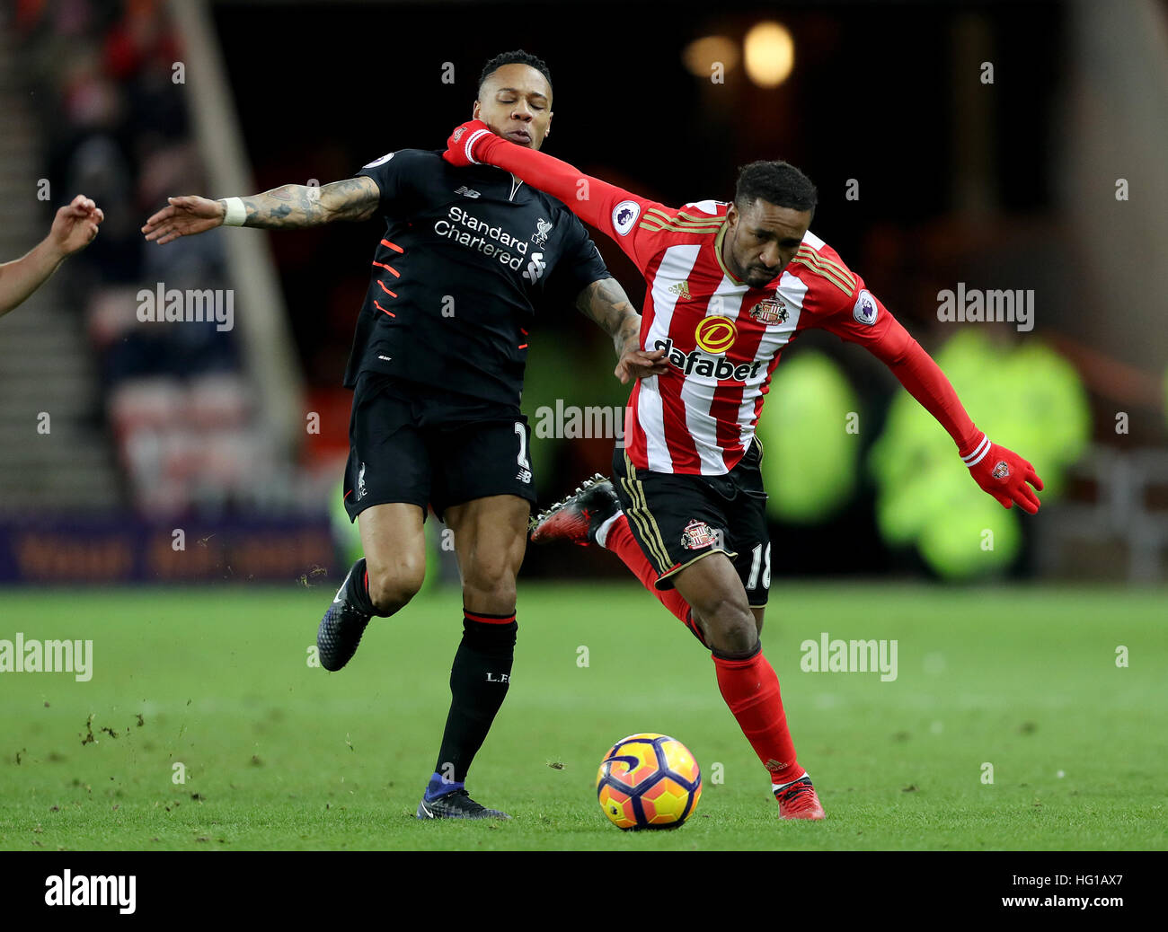 Liverpool's Nathaniel Clyne (left) and Sunderland's Jermain Defoe ...