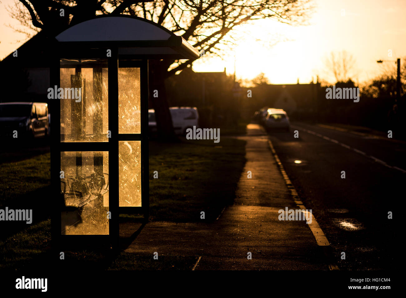 A bus stop in Hartwell village Northamptonshire, at sun set in winter Stock Photo