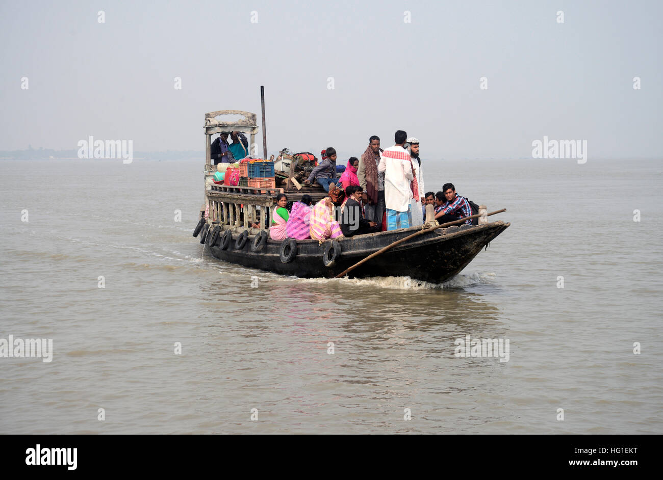 Kolkata, India. 02nd Jan, 2017. Ferry or motorized boat is the main communication of Sundarban, specially connecting island to island. The Sundarbans is the largest single block of tidal halophytic mangrove forest in the world. The forest lies at the end of the Ganges and is spread across areas of Bangladesh and West Bengal, India, forming the seaward fringe of the delta. © Saikat Paul/Pacific Press/Alamy Live News Stock Photo