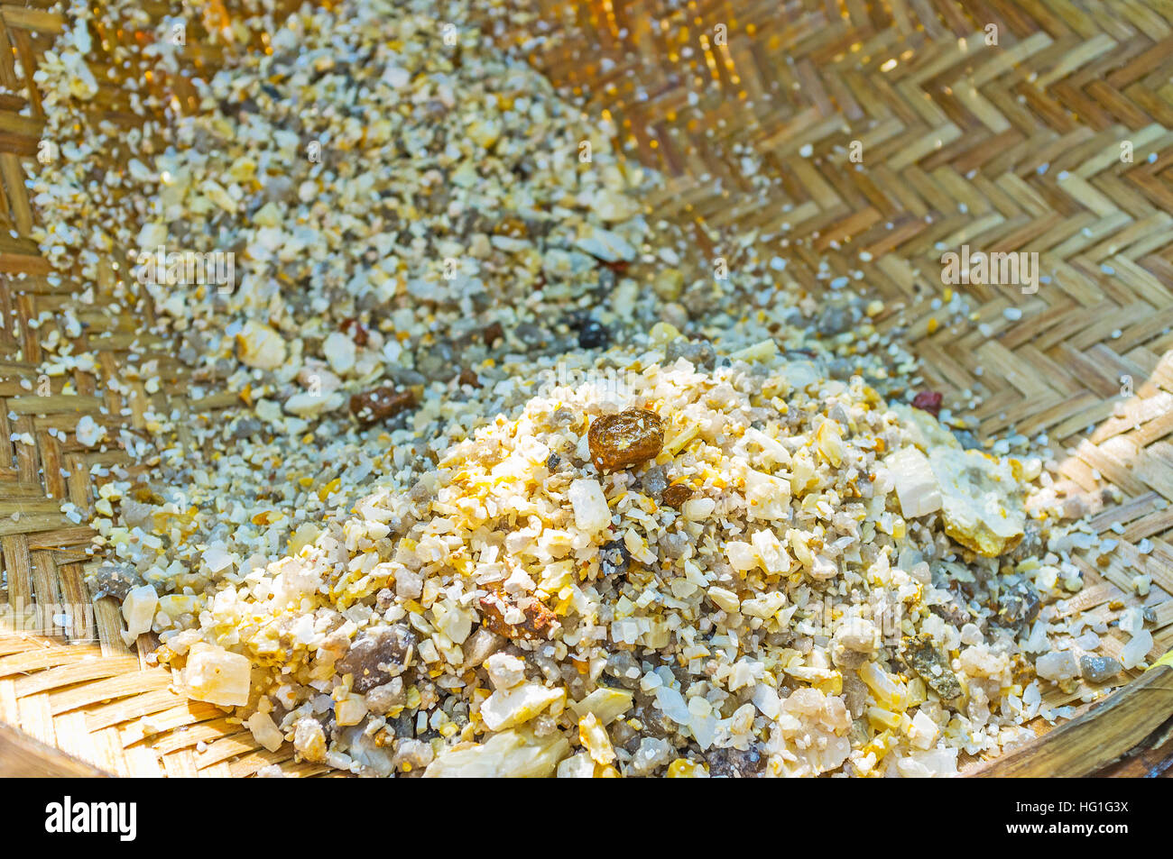The wicker basket, full of washed stones, extracted from moonstone mine