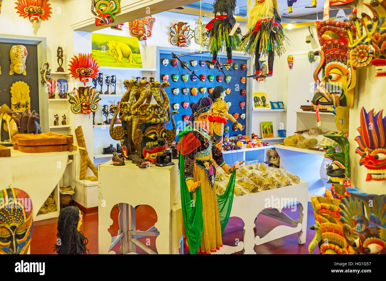 The interior of the store, that offers colorful masks and traditional puppets Stock Photo