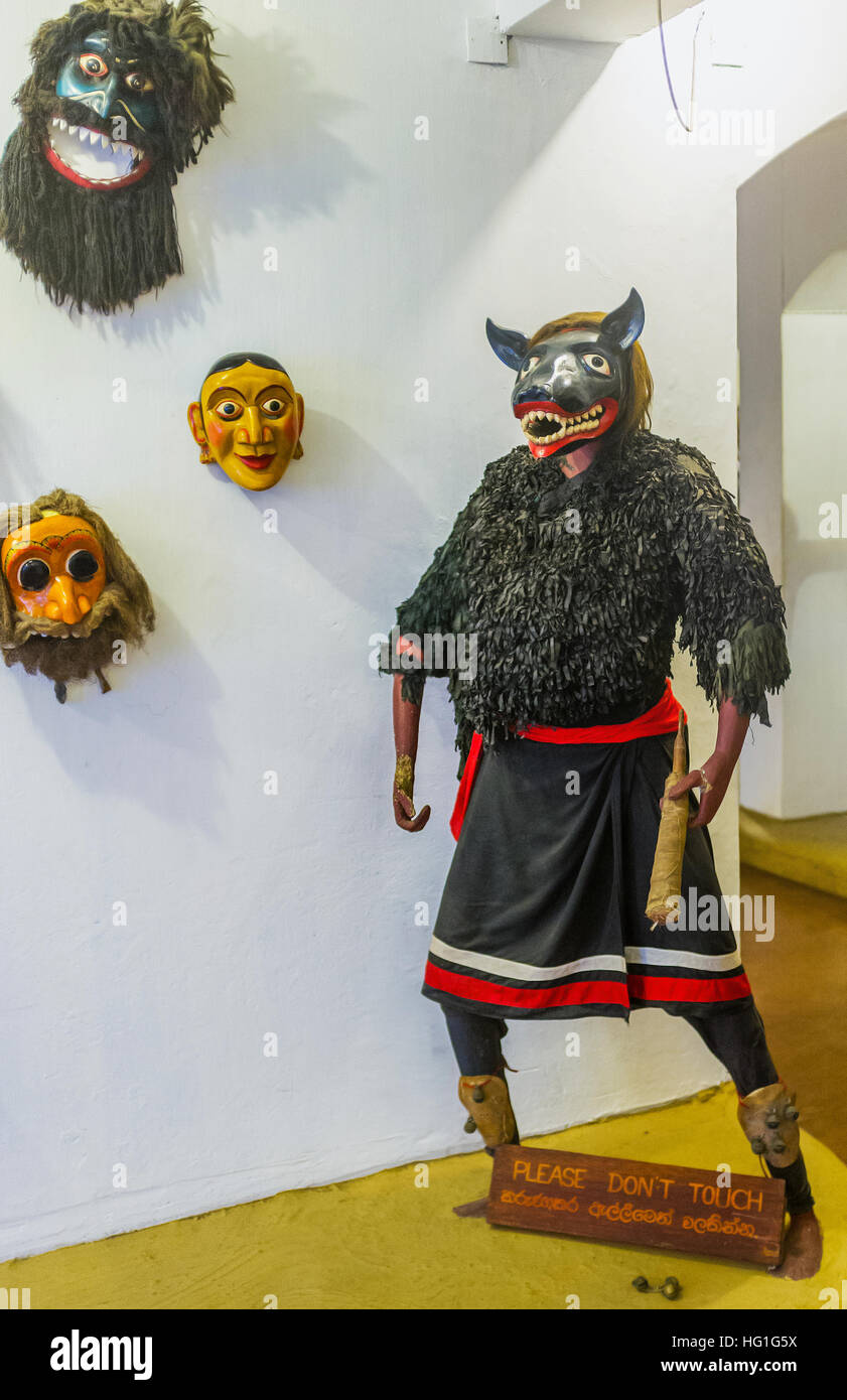 The mannequin in costume and mask for the Devil Dance in mask museum Stock Photo
