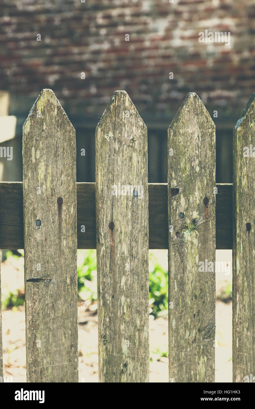 A closeup of an old, weathered fence. The wood is weathered. Stock Photo